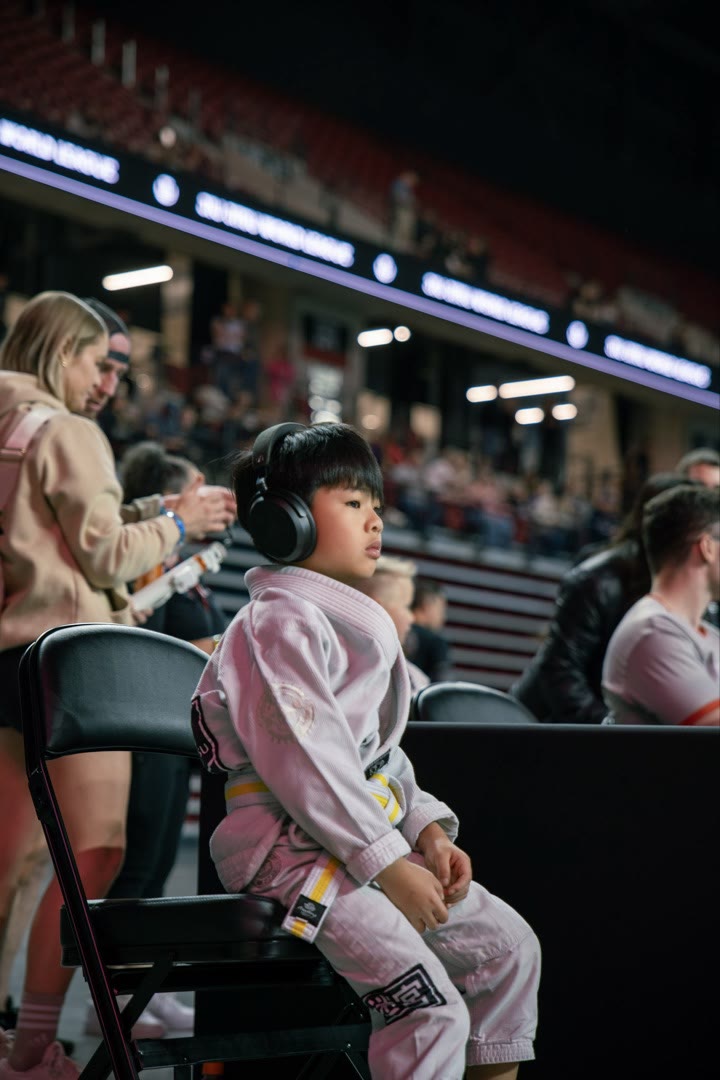 Young athlete focused at competition arena