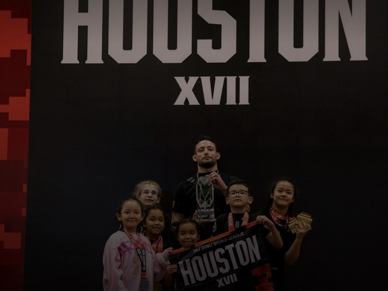 Kids Brazilian Jiu-Jitsu class training on the mat